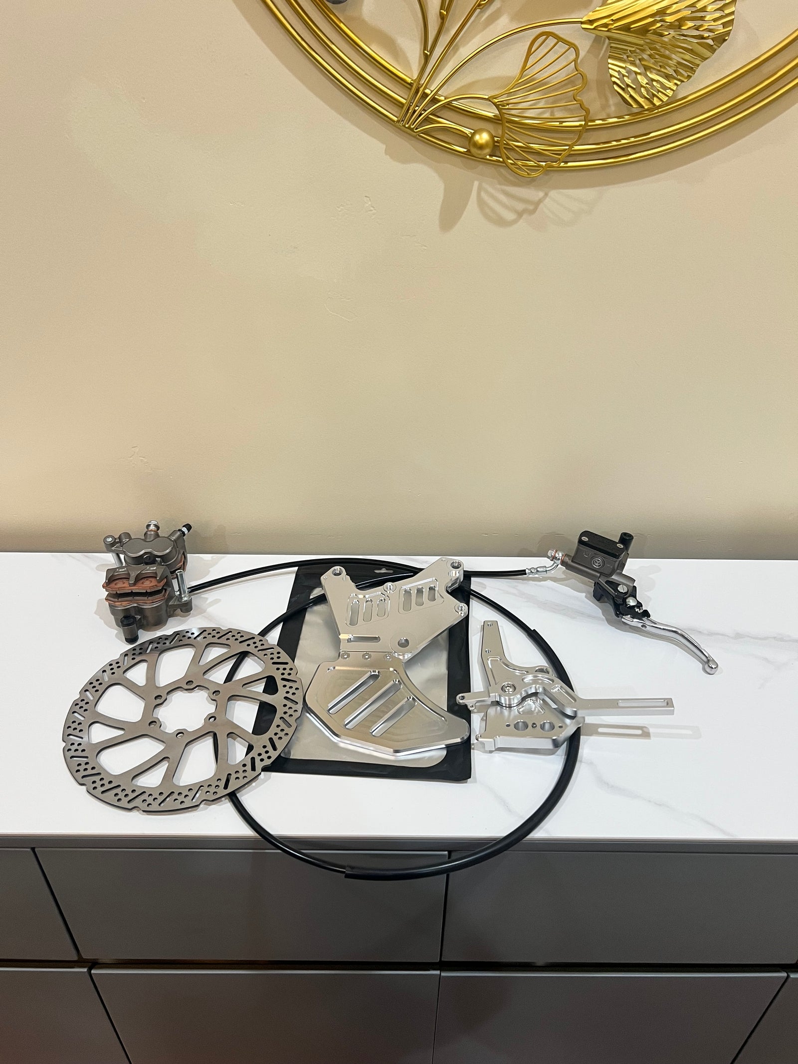 Complete rear hand and footbrake conversion kit for electric moto bikes