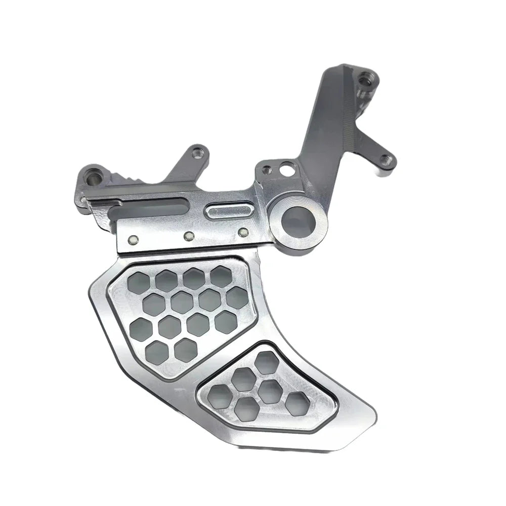 Silver Surron Ultra Bee dual-caliper brake mount